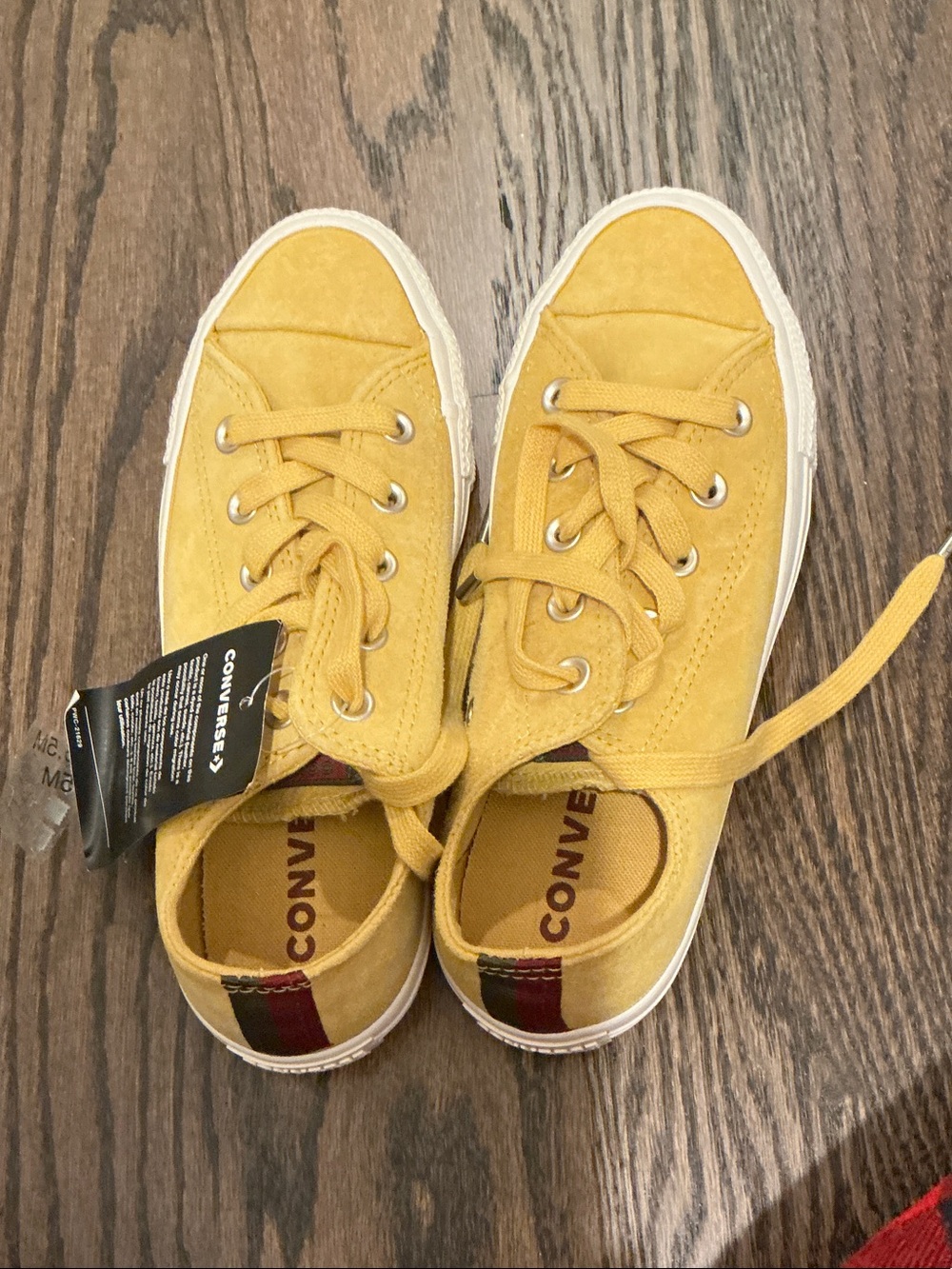 Converse Low Top Sneakers in Yellow with Red and Black Heel Stripe